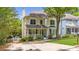 Charming two-story home with a welcoming front porch and well-manicured lawn at 2653 W Main Nw St, Atlanta, GA 30318