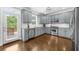 Modern kitchen featuring stainless steel appliances and access to an outdoor deck at 2653 W Main Nw St, Atlanta, GA 30318