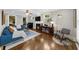 Inviting living room with a fireplace, modern furniture, and ample natural light at 2653 W Main Nw St, Atlanta, GA 30318