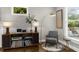Cozy living room featuring a classic entertainment center with vintage audio equipment and comfortable seating at 2653 W Main Nw St, Atlanta, GA 30318