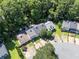 Aerial view of a neighborhood featuring well-maintained homes and mature trees at 289 Westland Sw Way, Marietta, GA 30064