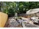 Well-maintained backyard featuring a garden, patio, and seating at 289 Westland Sw Way, Marietta, GA 30064