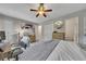 Spacious bedroom with a ceiling fan, mounted TV, closet, and neutral decor at 289 Westland Sw Way, Marietta, GA 30064