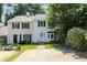Charming townhouse with mature landscaping and a well manicured lawn leading up to this home at 289 Westland Sw Way, Marietta, GA 30064