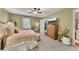 A spacious main bedroom features natural light, a large dresser, a walk-in closet, and neutral tones at 289 Westland Sw Way, Marietta, GA 30064