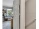 Upstairs landing featuring an open doorway to an office space and a view of the stairway and railing at 289 Westland Sw Way, Marietta, GA 30064