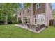 A large patio area with room for dining in a secluded backyard at 4046 Newhaven Ne Cir, Atlanta, GA 30319
