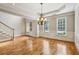 Elegant dining room features hardwood floors, detailed trim, and decorative lighting, creating a sophisticated ambiance at 4046 Newhaven Ne Cir, Atlanta, GA 30319