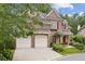 Charming brick home with a well-manicured lawn and two-car garage at 4046 Newhaven Ne Cir, Atlanta, GA 30319