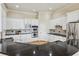 Modern kitchen features white cabinets, stainless steel appliances, and granite countertops at 4046 Newhaven Ne Cir, Atlanta, GA 30319