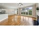 Bright living room featuring hardwood floors, large windows, and an open floor plan at 4046 Newhaven Ne Cir, Atlanta, GA 30319