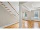 A high-ceiling foyer with hardwood staircase and floors at 4046 Newhaven Ne Cir, Atlanta, GA 30319