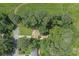 Aerial view of home on a large lot surrounded by mature trees in established neighborhood at 539 Karen Dr, Alpharetta, GA 30009