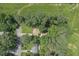 Aerial view of home on a large lot surrounded by mature trees in established neighborhood at 539 Karen Dr, Alpharetta, GA 30009