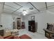 Finished basement with gaming and entertainment area including television and arcade game at 711 Belgrave Ln, Tucker, GA 30084