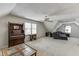 Large bonus room with neutral walls and carpet great for an office, living, or media space at 711 Belgrave Ln, Tucker, GA 30084