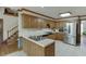 Well-lit kitchen with stainless steel appliances and seamless access to the stairway at 711 Belgrave Ln, Tucker, GA 30084