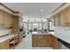 Bright eat-in kitchen with tiled floors, breakfast area, and bright interiors at 711 Belgrave Ln, Tucker, GA 30084