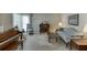 Bright living room with a piano, comfortable seating, and ample natural light at 711 Belgrave Ln, Tucker, GA 30084