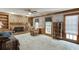 Cozy living room with a brick fireplace, built-in shelves, and comfortable seating at 711 Belgrave Ln, Tucker, GA 30084