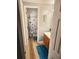 Bathroom featuring a shower with a decorative curtain, wood-look floors, and a classic vanity at 102 Ashbury Dr, Villa Rica, GA 30180