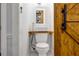 Compact bathroom design with vessel sink and rustic wood accents at 1747 Parkhill Dr, Decatur, GA 30032