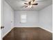 Empty bedroom with hardwood floors and a ceiling fan is waiting for your design ideas at 1747 Parkhill Dr, Decatur, GA 30032