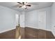 Spacious bedroom featuring wood floors, ceiling fan and freshly painted walls at 1747 Parkhill Dr, Decatur, GA 30032