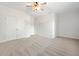 Bedroom features neutral carpet and white walls with doors to other rooms at 3134 Hudson Pond Ln, Marietta, GA 30062