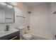 Beautifully updated bathroom with a shower and vanity with black accents at 3570 Briar Dr, Lithia Springs, GA 30122