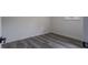 This bedroom features hardwood floors, fresh paint and a window view at 3570 Briar Dr, Lithia Springs, GA 30122