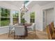 Bright breakfast nook with skylight and beautiful views of the surrounding greenery at 1863 Wicks Valley Ne Dr, Marietta, GA 30062