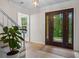 Elegant foyer featuring a decorative front door and tiled flooring at 1863 Wicks Valley Ne Dr, Marietta, GA 30062