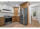 Well-lit kitchen with stainless steel appliances and stylish countertops at 1863 Wicks Valley Ne Dr, Marietta, GA 30062