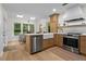 Modern kitchen with stainless steel appliances, and island with a dining area at 1863 Wicks Valley Ne Dr, Marietta, GA 30062