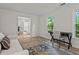 Cozy living room with plenty of light, a desk, and an open floor plan at 1863 Wicks Valley Ne Dr, Marietta, GA 30062