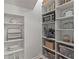 Spacious pantry with ample shelving for organized storage at 1863 Wicks Valley Ne Dr, Marietta, GA 30062