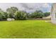 Spacious backyard with a well-manicured lawn, ideal for outdoor entertaining and Gathering activities at 250 Meadow View Dr, Grayson, GA 30017