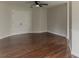 Spacious bedroom featuring hardwood floors, double closet doors, and neutral decor at 250 Meadow View Dr, Grayson, GA 30017