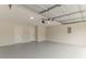 Expansive garage with ample room, featuring a secure door and convenient access points at 250 Meadow View Dr, Grayson, GA 30017