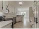 Modern kitchen with stainless steel appliances, white cabinets, and quartz countertops at 250 Meadow View Dr, Grayson, GA 30017
