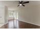 Comfortable living room featuring hardwood floors and French doors to the backyard at 250 Meadow View Dr, Grayson, GA 30017