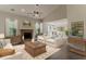 Comfortable living room with fireplace, neutral decor, and ample natural light at 250 Meadow View Dr, Grayson, GA 30017