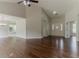 Spacious living room featuring hardwood floors and a vaulted ceiling at 250 Meadow View Dr, Grayson, GA 30017