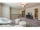 Bonus room with gray carpet, mini fridge and ceiling fan providing a comfortable space at 3291 Wild Basil Ln, Buford, GA 30519