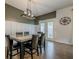 Dining area featuring direct outdoor access and modern wainscoting details at 3291 Wild Basil Ln, Buford, GA 30519