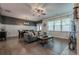 Bright and airy living room with hardwood floors and a fireplace at 3291 Wild Basil Ln, Buford, GA 30519