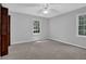 Inviting bedroom with large windows at 6896 Heardsville Rd, Cumming, GA 30028
