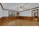 Living room boasts natural light and wood paneling at 6896 Heardsville Rd, Cumming, GA 30028