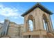 Close-up view of the rooftop terrace showcasing ornate architectural details and a clear blue sky at 75 Ponce De Leon Ne Ave # 1004, Atlanta, GA 30308
